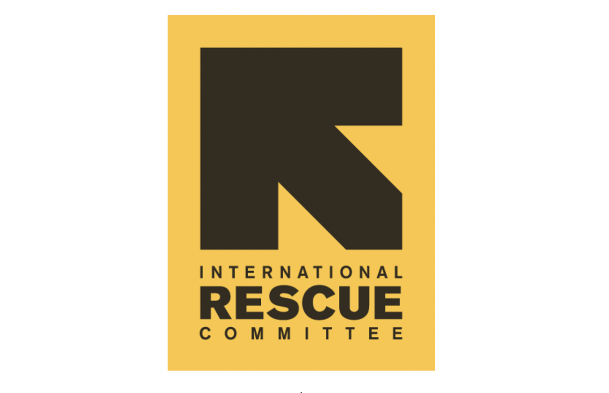 International Rescue Committee logo showing a diagonal left-oriented black arrow above the black writing INTERNATIONAL RESCUE COMMITTEE on a yellow background